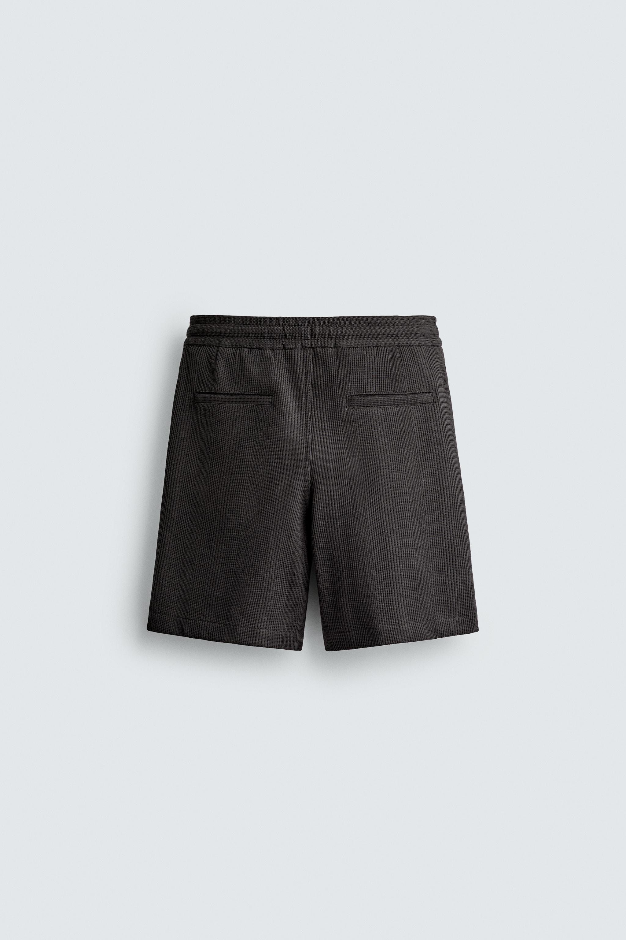 TEXTURED RELAXED FIT SHORTS
